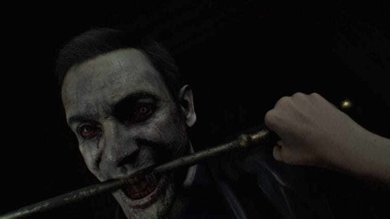 Hands-on close-up showing features of Resident Evil Requiem review