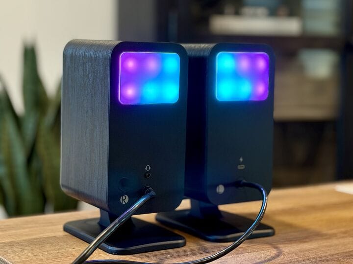 Hands-on close-up showing features of Klipsch Pro Media Lumina