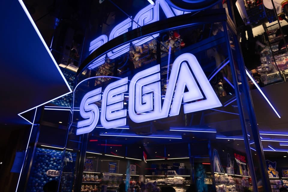 Hands-on close-up showing features of Sega financial loss Super